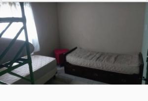 En eller flere senge i et værelse på Olgas