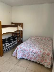 Postel nebo postele na pokoji v ubytování Solar Miranda Olímpia SP Thermas dos Laranjais