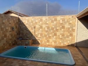 Bazén v ubytování Solar Miranda Olímpia SP Thermas dos Laranjais nebo v jeho okolí