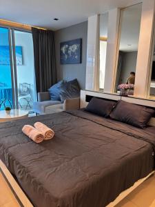 Ένα ή περισσότερα κρεβάτια σε δωμάτιο στο Tropical studio with seaview