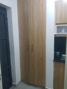 Η κουζίνα ή μικρή κουζίνα στο Amazing StaysBnB near JKIA