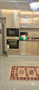 Kuchyň nebo kuchyňský kout v ubytování Tola Residences by Aqua- Luxury one bedroom in Nyali Mombasa with pool + 1 fotografie