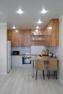 Nhà bếp/bếp nhỏ tại Almaty Aspan Comfort Apartment