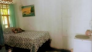 Ένα ή περισσότερα κρεβάτια σε δωμάτιο στο SeaSide B&B