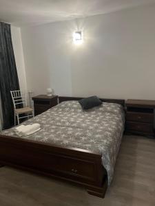 Een bed of bedden in een kamer bij Casa Bogdan