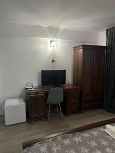 Een TV en/of entertainmentcenter bij Casa Bogdan
 +4 foto's