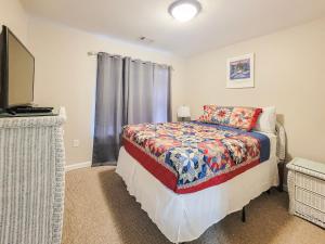 Ένα ή περισσότερα κρεβάτια σε δωμάτιο στο Cozy 2 bedroom, 2 bathroom condo located at Harbor Landing! +20 φωτογραφίες