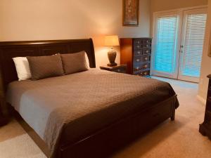 Ένα ή περισσότερα κρεβάτια σε δωμάτιο στο Legacy Villa 1306 - 2 bedroom 2 bath with garage in beachside neighborhood +16 φωτογραφίες