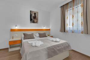 Katil atau katil-katil dalam bilik di Apartmani Podest +91 gambar