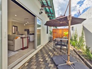 Patio nebo venkovní prostory v ubytování The Emerald Apartments Ibex Meanwood