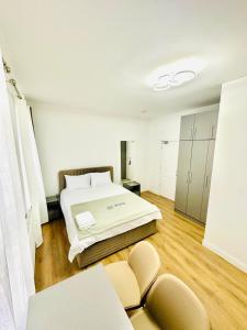 Ένα ή περισσότερα κρεβάτια σε δωμάτιο στο Nottingham Forest The City Ground Studio Apartments +10 φωτογραφίες