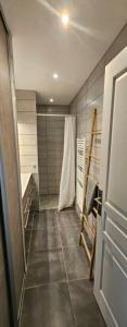 a bathroom with a walk in shower next to a shower at Villa Lucitello by Monarca Location, refuge Familial à 10 minutes de Saint Florent in Barbaggio +24 photos