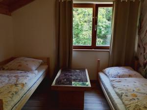 Postel nebo postele na pokoji v ubytování Waldbach-Oase