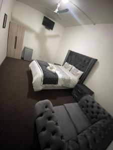 Ένα ή περισσότερα κρεβάτια σε δωμάτιο στο Braam guest house +5 φωτογραφίες