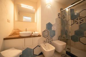 Ένα μπάνιο στο Appartamenti - Villa Mare