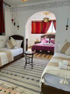 Postel nebo postele na pokoji v ubytování Riad Dar Bahja - More Than a Stay
