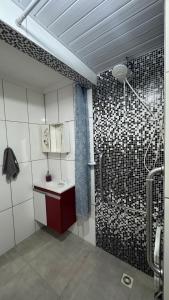 Ένα μπάνιο στο Hospedagem 3 Estrelas