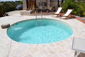 Πισίνα στο ή κοντά στο trulli annina con piscina