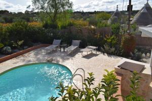 Πισίνα στο ή κοντά στο trulli annina con piscina