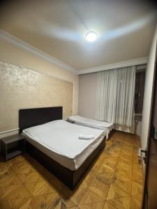 Ένα ή περισσότερα κρεβάτια σε δωμάτιο στο Allegro hotel-hostel