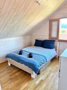 Ένα ή περισσότερα κρεβάτια σε δωμάτιο στο Chalet Doux Refuge - 1 à 6 personnes - Plaine des Palmistes +11 φωτογραφίες