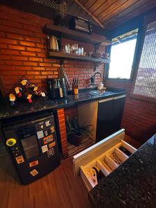 Η κουζίνα ή μικρή κουζίνα στο Cabana Odara