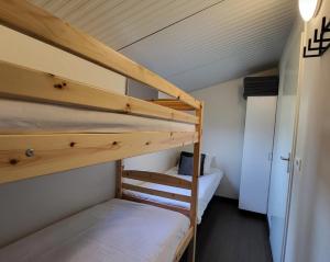 Postel nebo postele na pokoji v ubytování Woobcabin Gasselte