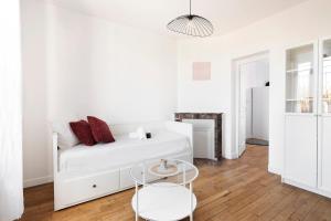 Ein Bett oder Betten in einem Zimmer der Unterkunft Cozy apartment at the gates of Paris 1BDR