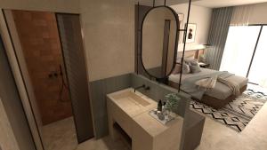 Una cama o camas en una habitación de Vasia Resort & Spa