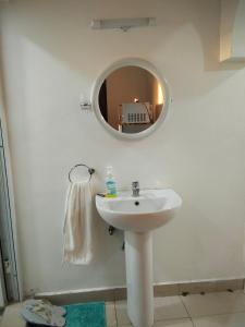 Koupelna v ubytování Bensa Homes + 18 fotografií