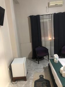 Ένα ή περισσότερα κρεβάτια σε δωμάτιο στο Hôtel ikrams