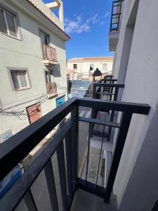 a balcony with a view of a building at Hotel Wayteko San Antón in Alicante