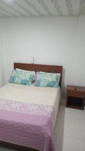 Ένα ή περισσότερα κρεβάτια σε δωμάτιο στο Hotel gran acapulco M&A