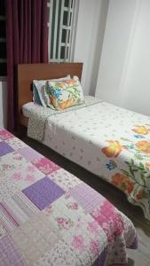 Ένα ή περισσότερα κρεβάτια σε δωμάτιο στο Hotel gran acapulco M&A