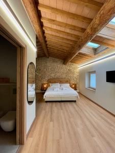 Postel nebo postele na pokoji v ubytování Corte Bonfiglio Colombari