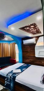 Postel nebo postele na pokoji v ubytování Hotel Royal Stay + 3 fotografie