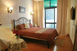 Postel nebo postele na pokoji v ubytování Yên Art Homestay