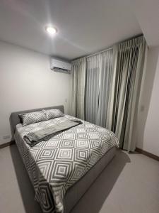 Ένα ή περισσότερα κρεβάτια σε δωμάτιο στο Brand New Luxe Condo - Amazing Ocean Views +46 φωτογραφίες