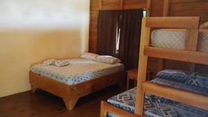 Ένα ή περισσότερα κρεβάτια σε δωμάτιο στο Villas Seashells