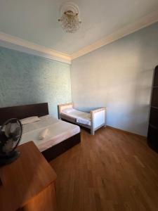 Ένα ή περισσότερα κρεβάτια σε δωμάτιο στο Allegro hotel-hostel +2 φωτογραφίες