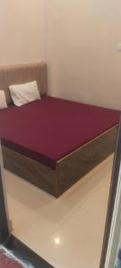 Voodi või voodid majutusasutuse Kashi kedar paying guest house toas