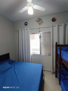 Voodi või voodid majutusasutuse Aconchego do mar - Canto do Forte - Praia Grande toas