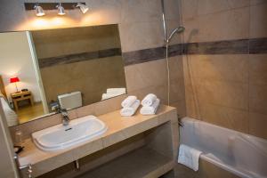 Koupelna v ubytování Hotel Cesario