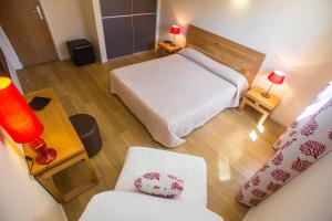 Postel nebo postele na pokoji v ubytování Hotel Cesario