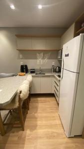 Η κουζίνα ή μικρή κουζίνα στο Studio 210 Charme e Aconchego