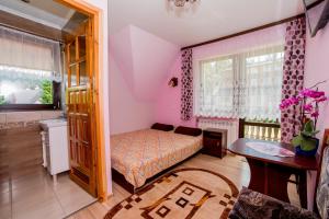 Posteľ alebo postele v izbe v ubytovaní Pokoje Apartamenty Pod Limbą