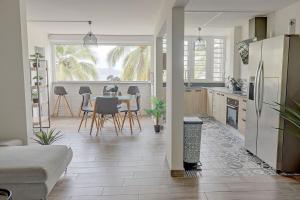 Kuchyň nebo kuchyňský kout v ubytování Appartement cosy avec vue sur mer