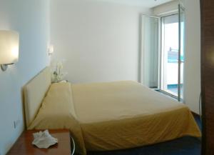 Residence Adriatico tesisinde bir oda