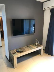 TV a/nebo společenská místnost v ubytování Solares V Pinamar