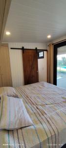 Postel nebo postele na pokoji v ubytování Cabañas Limonares de Olmué